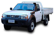 Nissan Navara D22 pickup truck with open cargo bed and Safari branding