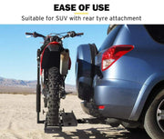 San Hima Adjustable Motorcycle Carrier Rack with Ramp attached to SUV rear for easy hauling