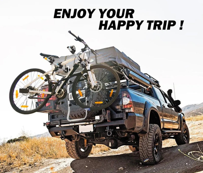 San Hima tire rack with spare wheel and loaded outdoor gear including bicycle