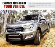 Silver Ford Ranger truck with San Hima nudge bar on dirt road surrounded by trees