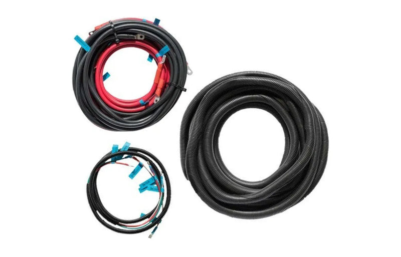 Coiled black hoses with red and blue components in Viper Pro Marine Anchor Winch Wiring Looms featuring tinned copper wiring