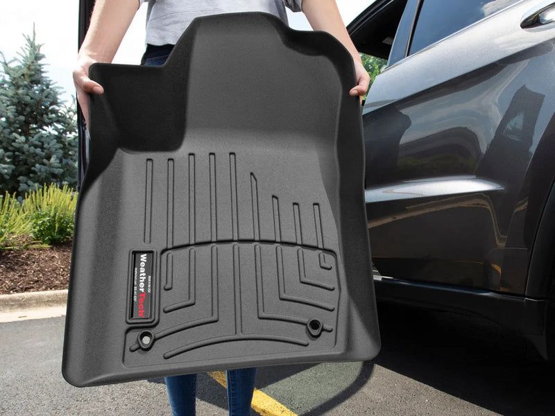 WeatherTech FloorLiner with raised edges and textured surface for vehicle protection