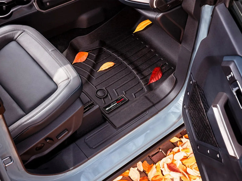 WeatherTech FloorLiner installed in vehicle interior showing custom-fit design for floor protection