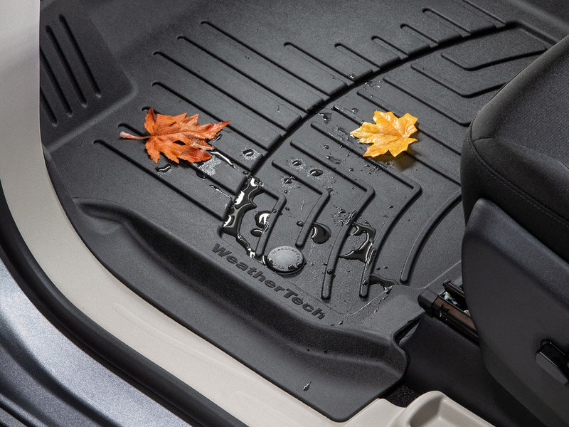 WeatherTech high performance rear floor mats with autumn leaves and water droplets