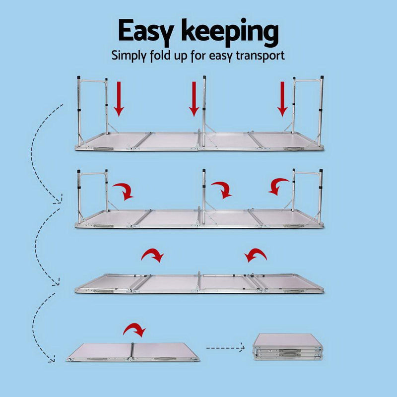 Foldable camping table with collapsible metal poles and flat surface for portable camping use