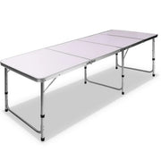 Folding camping table with white top and adjustable legs for portable outdoor use