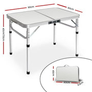 Weisshorn Foldable Kitchen Camping Table with adjustable legs and white top surface