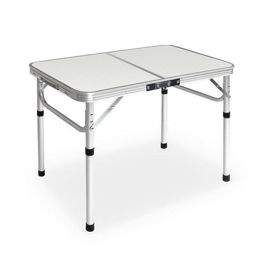 Portable folding camping table with adjustable aluminum legs and white top surface