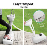 Portable camping wash basin with wheels and step-on pump for easy transport