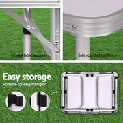Weisshorn Portable Folding Camping Table with metal frame and hinged supports for easy storage