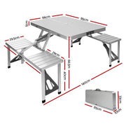 Portable folding camping table with attached benches from Weisshorn’s camping table set